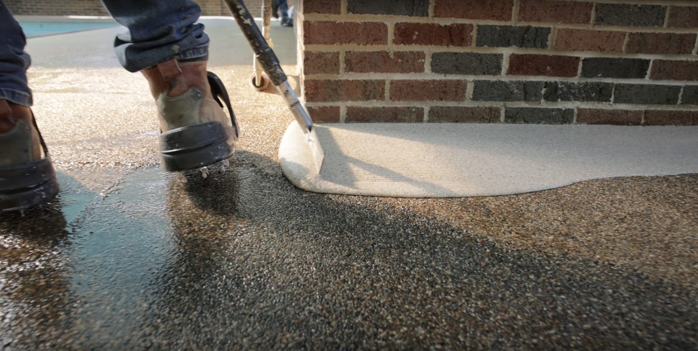 Professional concrete finishing and curing process in Sunrise FL